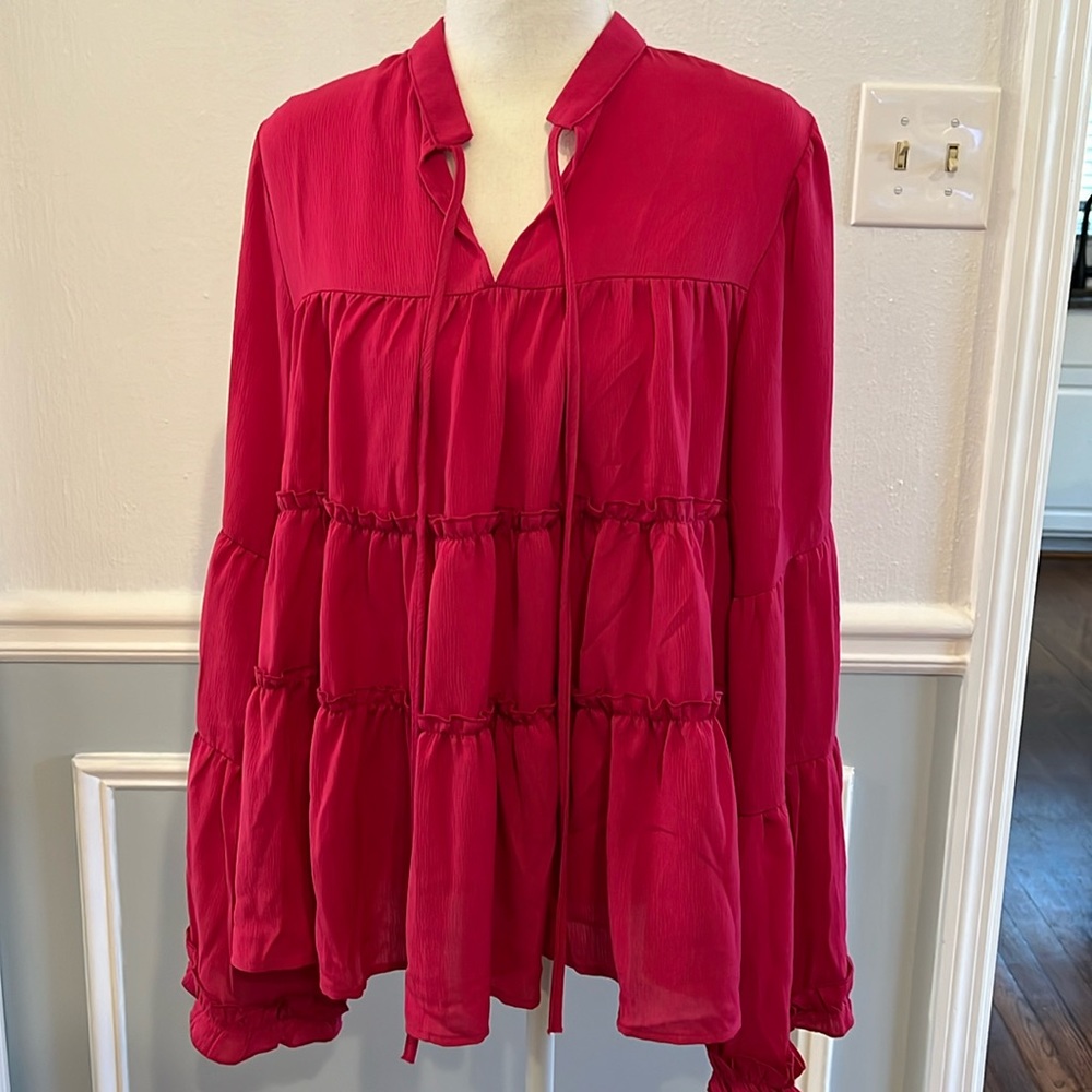Like new pink ruffle blouse with flowy long sleeves - size small